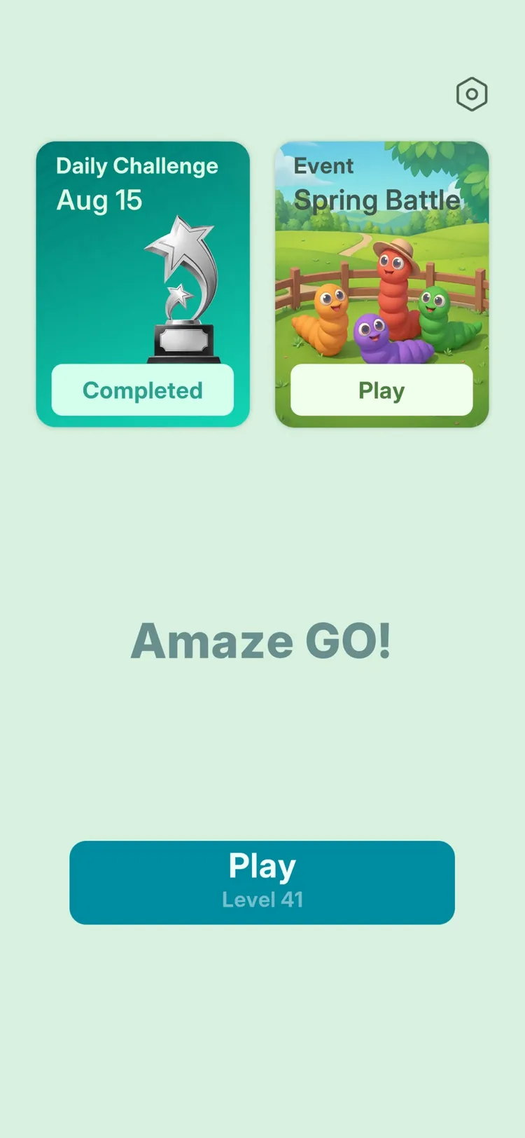 The Amaze GO! home screen: a completed Daily Challenge card, a Spring Battle event with four colourful caterpillar characters, and a Play button showing Level 41